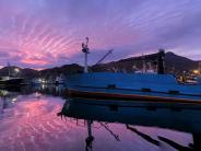 Sunset over the Summer Bay Photo by Eryn Whittern