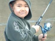 Young boy fishing